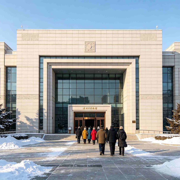 Exterior view of Jilin Museum building with snow-covered ground in winter