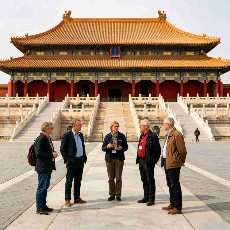 Foreign tourists on a guided tour at the Forbidden City imperial palace, Beijing China