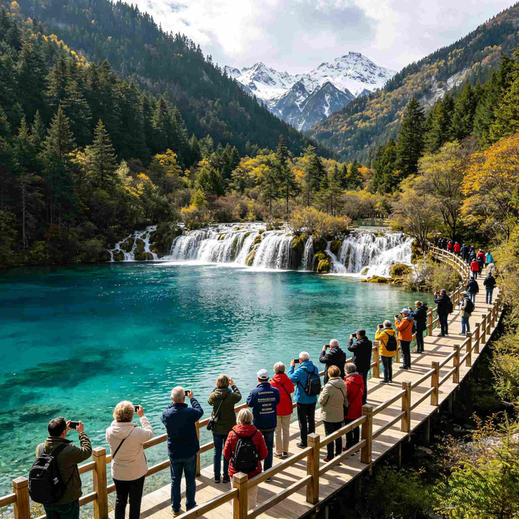 Crystal turquoise alpine lake with wooden boardwalk in Jiuzhaigou National Park, guided tour group enjoying scenery