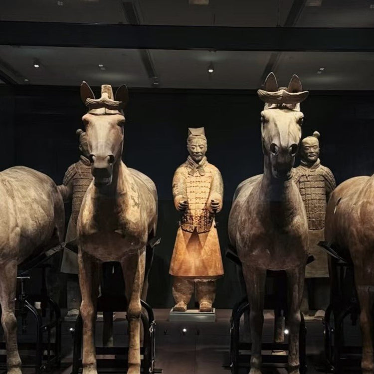 Terracotta horses and warrior figures at ancient museum