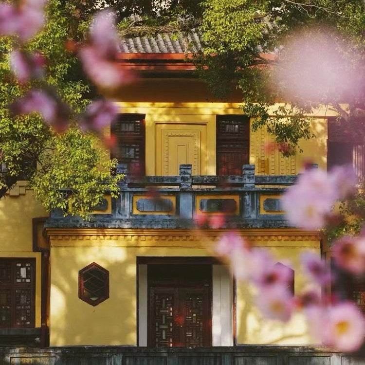 Ancient yellow palace building of Solitary Beauty Peak, Guilin historic landmark