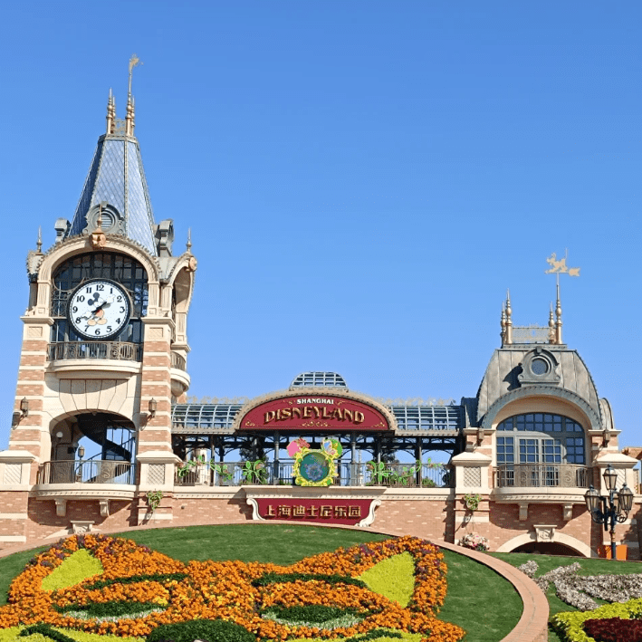 Shanghai Disneyland entrance clock tower with Mickey clock, family travel spot for Shanghai private city tour