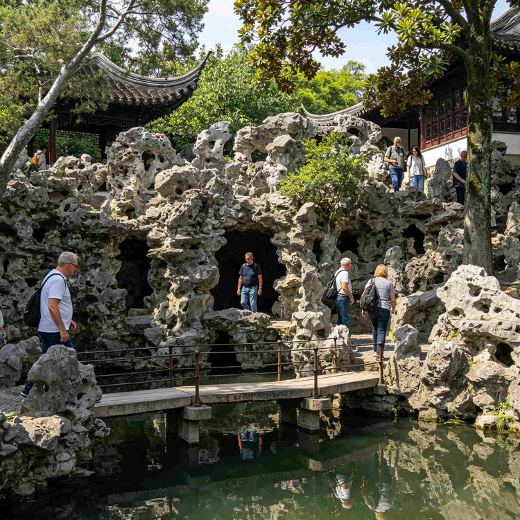 Pingjiang Road ancient canal street Suzhou water town, foreign guests walk riverside all