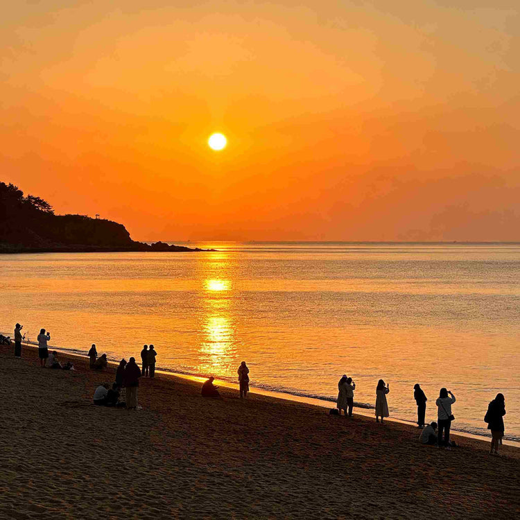 Golden sunset view at Silver Beach, Dalian coastal scenery