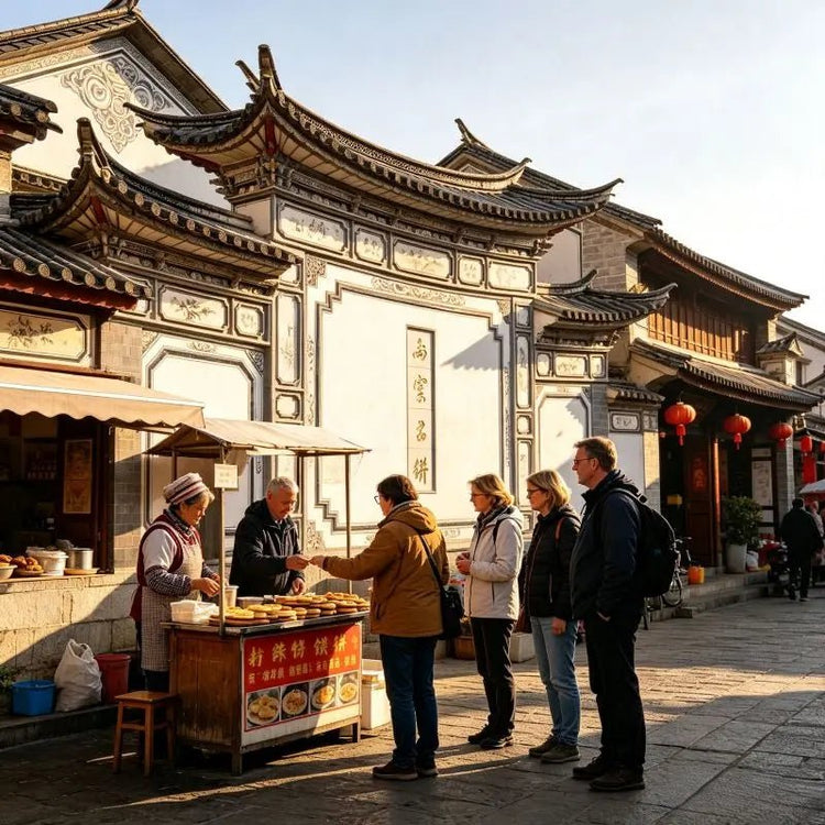 Western tourists buying local snacks from vendor in Xizhou Ancient Town, Dali