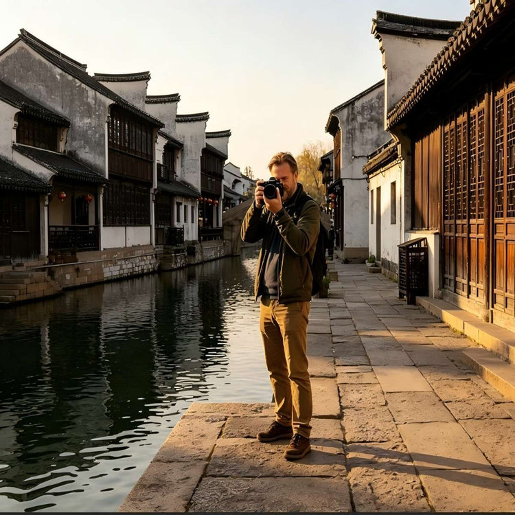 Foreign traveler wandering quiet ancient lanes in Nanxun Ancient Town, Jiangnan