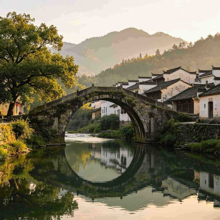Ancient stone arch bridge over river in Huizhou water town