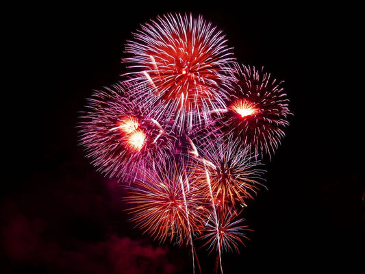 Colorful fireworks bursting at night for Chinese traditional festivals and celebrations