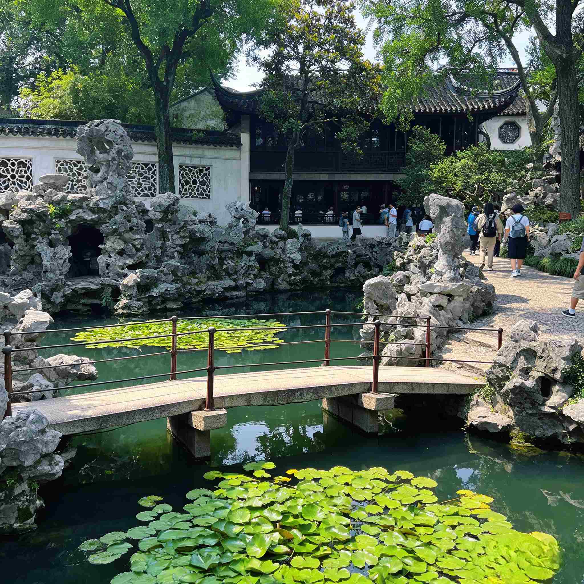 Travelers visiting the UNESCO-listed Humble Administrator's Garden, classical Suzhou garden private tour