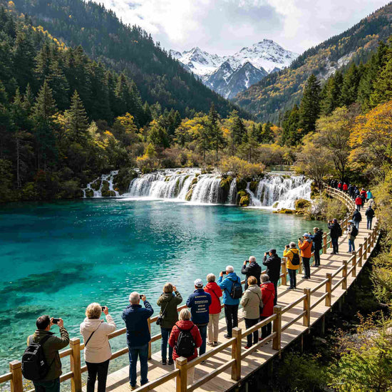 Crystal turquoise alpine lake with wooden boardwalk in Jiuzhaigou National Park, guided tour group enjoying scenery