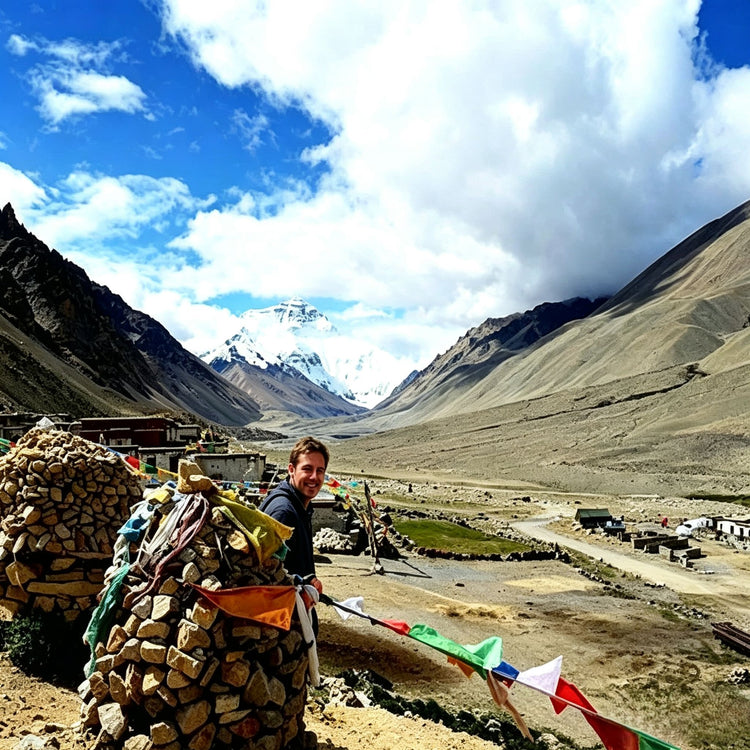 Everest valley landscape with mani piles and prayer flags at Rongbuk Monastery area