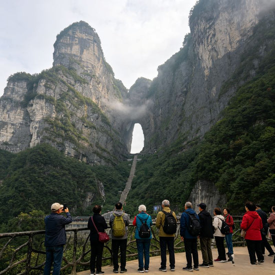 Tourists at Tianmen Cave viewpoint, Tianmen Mountain National Forest Park