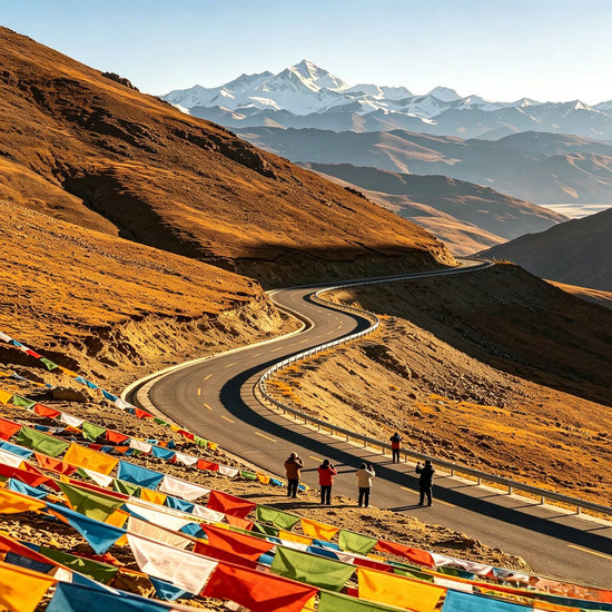 Winding high-altitude mountain road with prayer flags on the Everest route