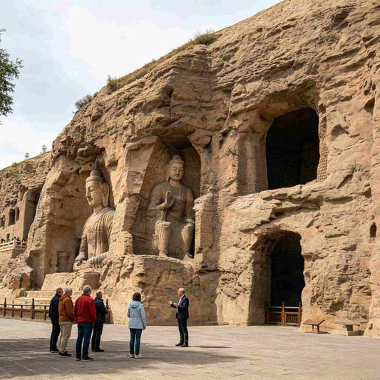 Foreign tourists visiting UNESCO-listed Yungang Grottoes with giant Buddha rock statues, Datong China