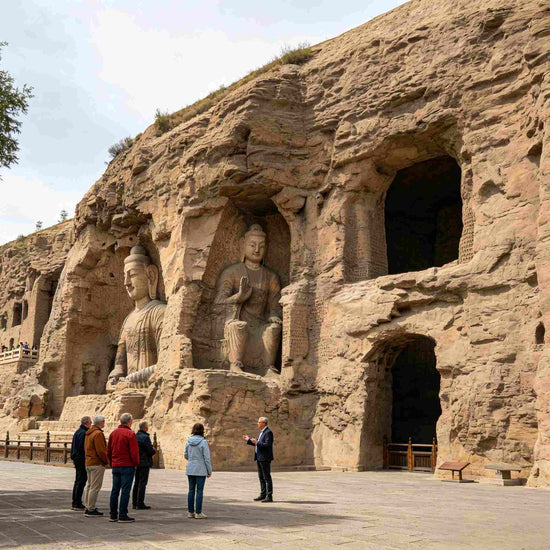 Foreign tourists visiting UNESCO-listed Yungang Grottoes with giant Buddha rock statues, Datong China