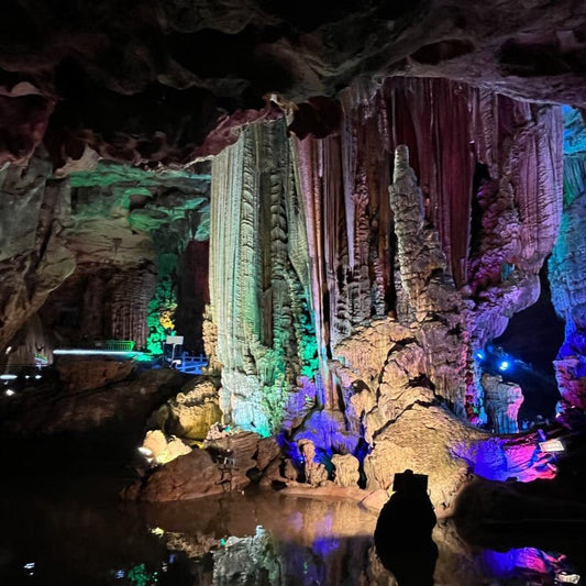 Colorful stalactite cave view inside Silver Cave, Guilin karst underground scenery