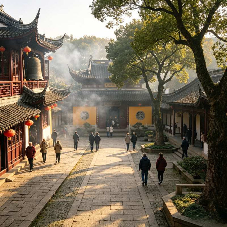 Hanshan Temple ancient Buddhist courtyard with incense smoke, visitors among temple buildings, Suzhou China
