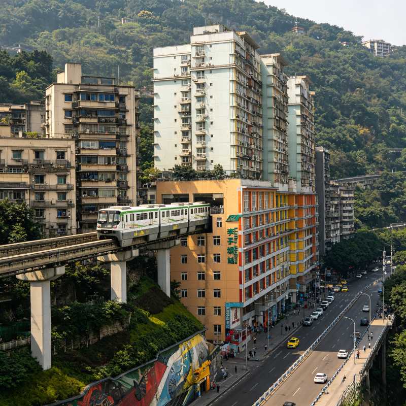 Light rail through building at Liziba Station, iconic urban landmark of Chongqing