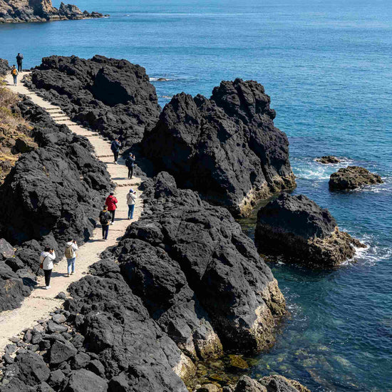Unique black rock coastline at Heishijiao Coastal Park, Dalian