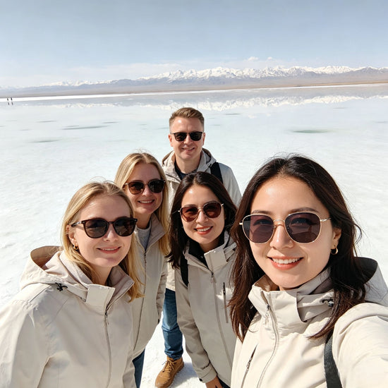 Group of female travelers taking a selfie at Chaka Salt Lake, Qinghai