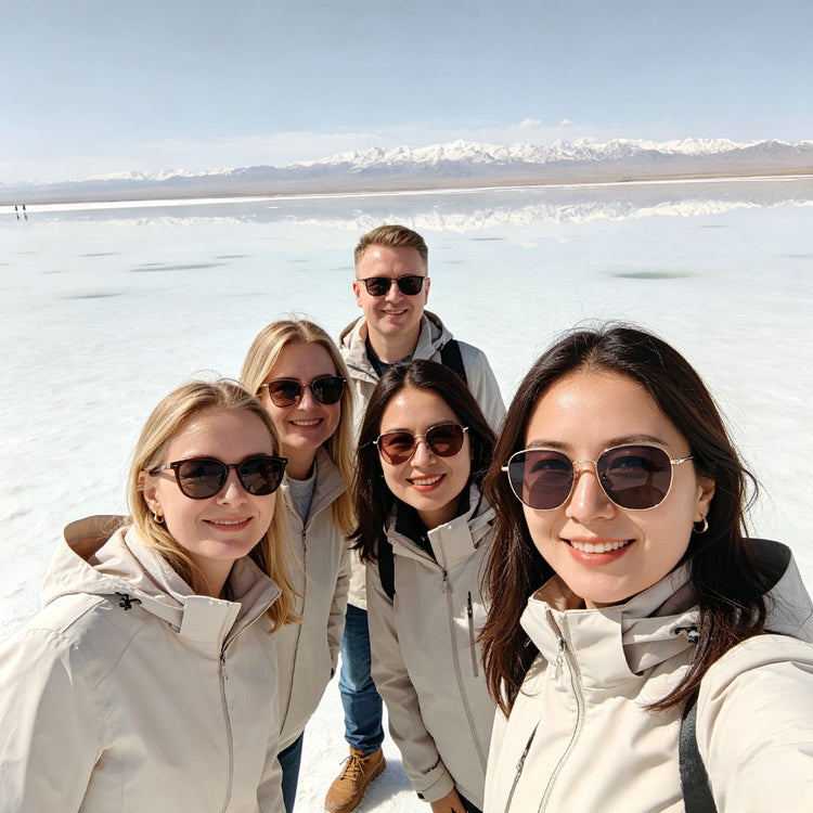 Group of female travelers taking a selfie at Chaka Salt Lake, Qinghai