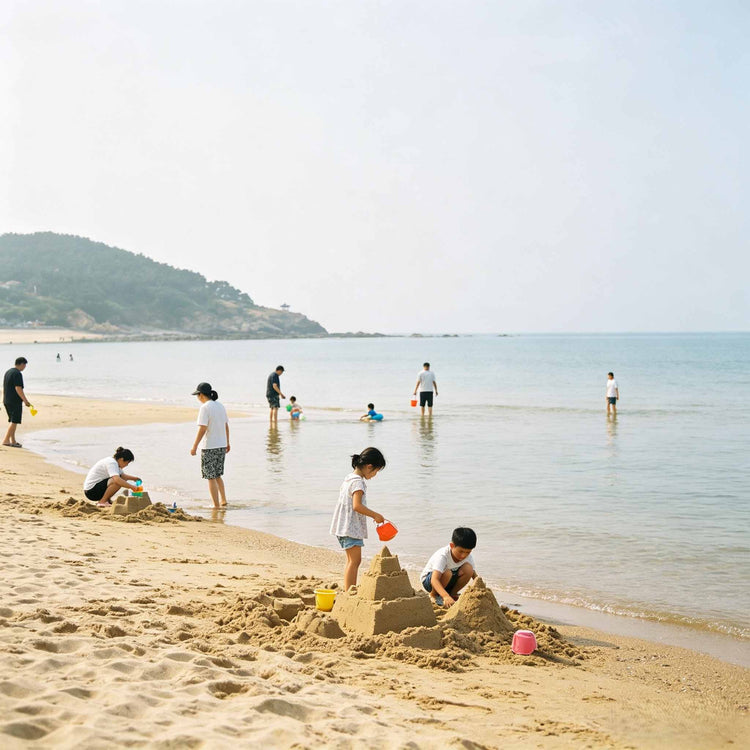 Families playing on sandy beach at Bangchui Island, Dalian