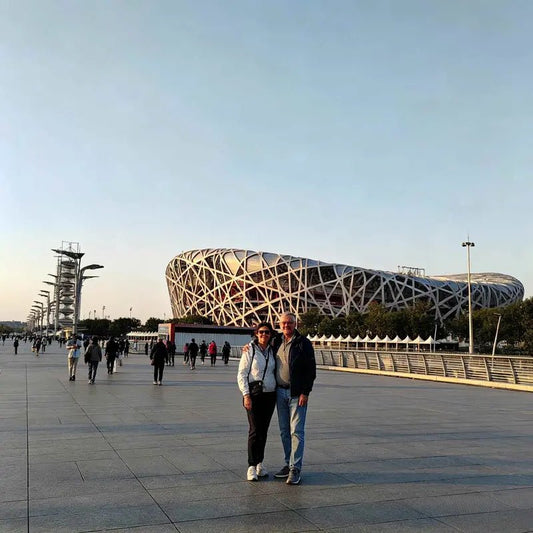 Western travelers at Bird's Nest National Stadium, Beijing Olympic Park, iconic 2008 Olympics architecture