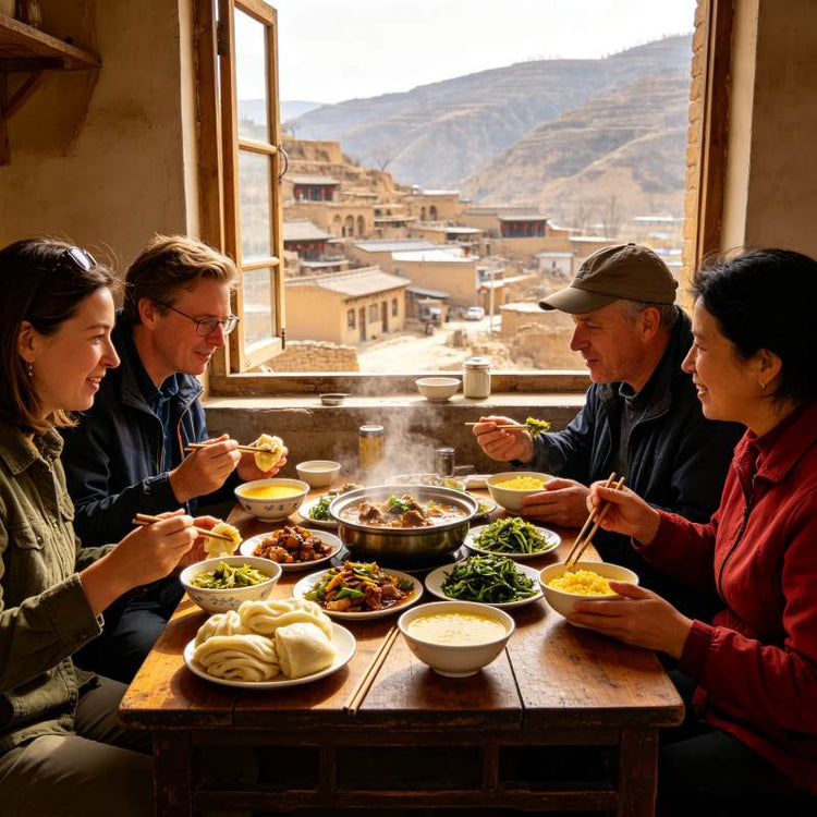 Western tourists enjoying Shaanxi farmhouse lunch at mountain-view restaurant with noodles, porridge & wild vegetable dishes