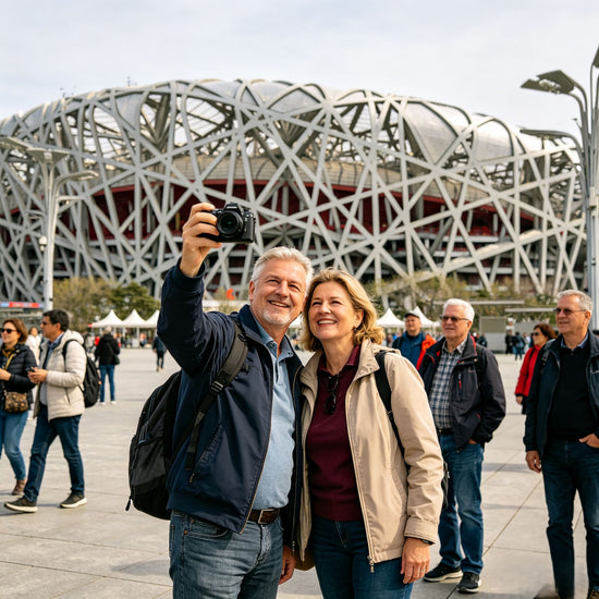 Foreign travelers posing for a group photo in front of the Bird’s Nest stadium, Beijing