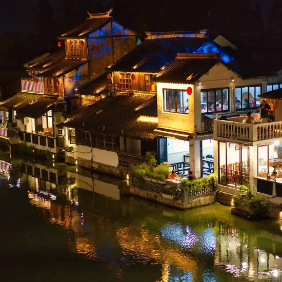 Wuzhen water town night canal houses red lanterns private tour
