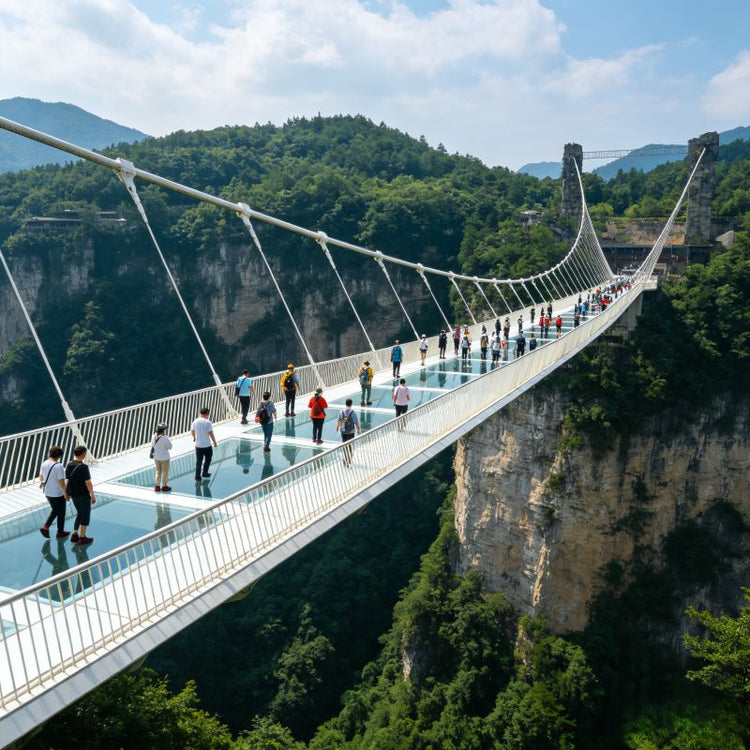 Zhangjiajie Grand Canyon Glass Bridge, travelers crossing the transparent glass suspension bridge 300m above the valley floor
