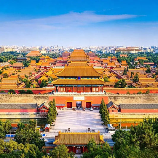 Forbidden City palace complex in Beijing, red walls and golden roofs along central axis, ancient Chinese imperial architecture