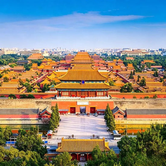 Forbidden City palace complex in Beijing, red walls and golden roofs along central axis, ancient Chinese imperial architecture