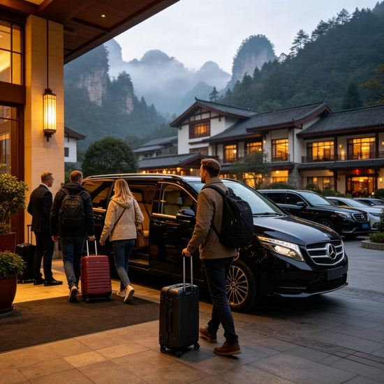 Western travelers arriving at mountain resort hotel with private transfer car and luggage, Zhangjiajie arrival scene